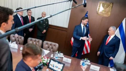 Reuters US Vice-President JD Vance (2nd R) and Israel's Prime Minister Benjamin Netanyahu (R) meet at the prime minister's office in Jerusalem (22 October 2025)