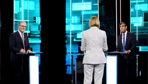 PA Media Prime Minister Rishi Sunak (right), host Julie Etchingham and Labour Party leader Sir Keir Starmer during the ITV General Election debate