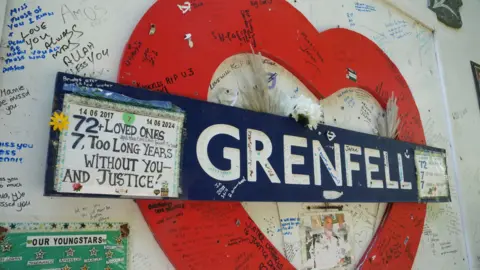 PA The Grenfell Memorial Wall in west London