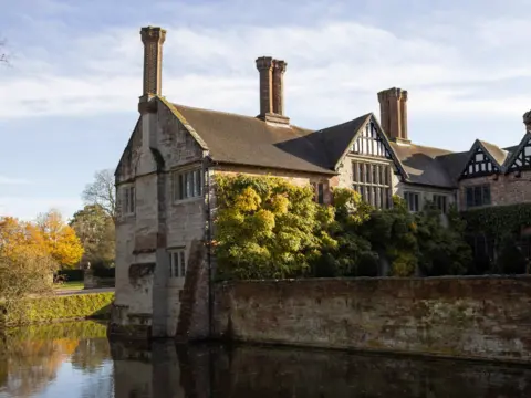 National Trust National Trust property Baddesley Clinton sits in the Warwickshire countryside surrounded by a moat.
