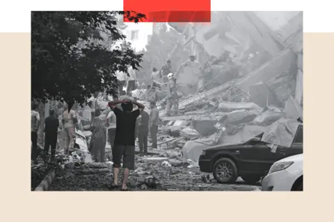 Getty Images People look over damage to buildings in Nobonyad Square following Israeli airstrikes on June 13, 2025 in Tehran, Iran