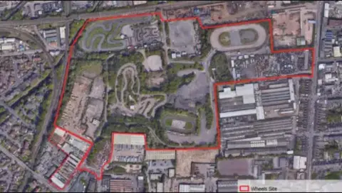 Birmingham City Council An aerial map shows a marked area of land that has been purchased for the scheme. It contains buildings and greenery.