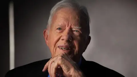 Jimmy Carter poses for a portrait