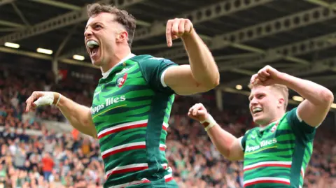 Adam Radwan celebrates a try
