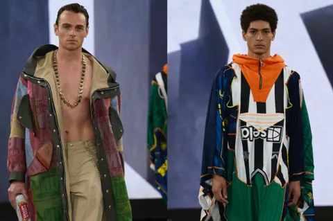 Two male models walking down the catwalk, both wearing garments made from vintage sportswear. The one on the left is wearing a jacket made of vintage scarfs and is holding a can of beer. The one on the right is wearing a repurposed Newcastle United shirt as a cape.