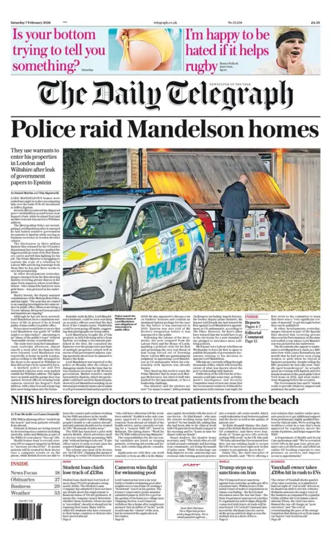  "Police raid Mandelson homes."