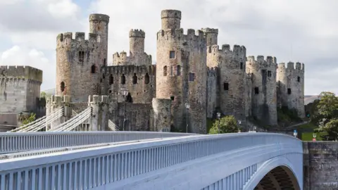 Getty Images Conwy Castle, with a modern road bridge in the foreground