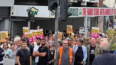 DAN JESSUP Counter-demonstrators in Hastings