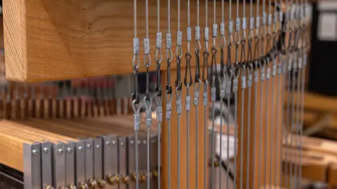 Tegen Kimbley A close-up image of parts of a loom