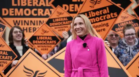 PA Media Lib Dem MP Helen Morgan with activists successful  2021