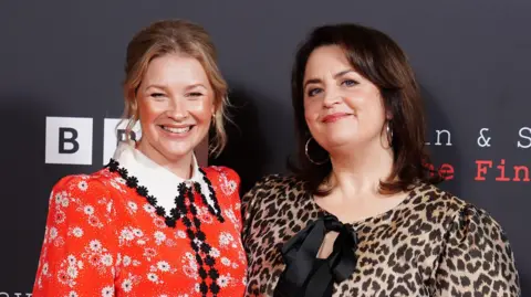 PA Media Joanna Page, who plays Stacey, with Ruth Jones, who plays Nessa and is the co-creator of the show