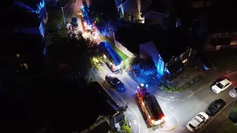 Three fire engines at the scene of the blaze in Hailsham, taken from above