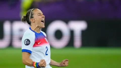 Lucy Bronze celebrates