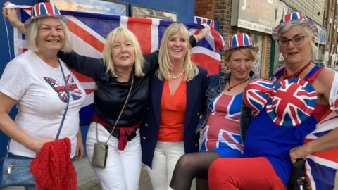 Residents got dressed up for the event and came with union flags to show their support