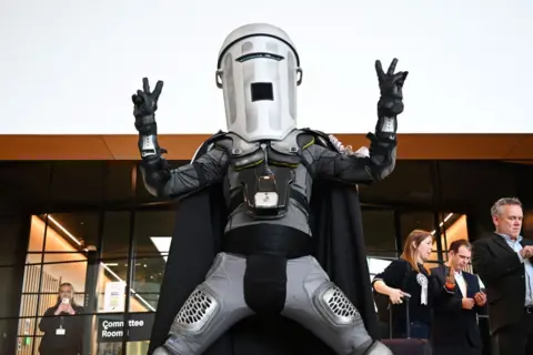 Getty Images Count Binface, a candidate who stands for elections dressed as an independent space warrior, with a bin-shaped helmet