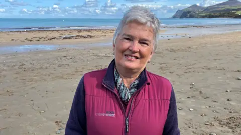 BBC News Picture of Gwenan Roberts at the beach, smiling