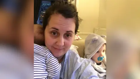 Family Handout Ms Battershall with her two sons