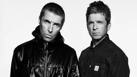 Fear PR/PA A black and white studio shot of Liam and Noel Gallagher. They are looking moody and staring at the camera