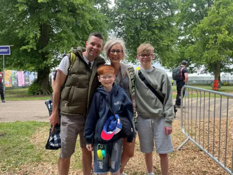A family of four at the Big Weekend festival