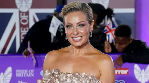 PA Amy Dowden no tapete vermelho do Pride of Britain Awards 2024