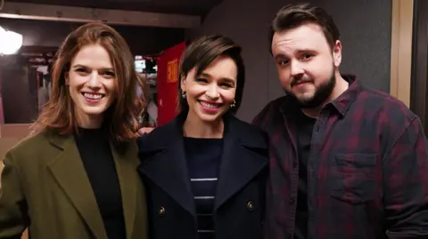 Getty Images Game of Thrones actors Rose Leslie, Emilia Clarke, and John Bradley pictured together in a TV studio on Saturday, 6 April, 2019