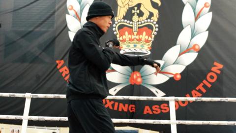 Boxer trains in the ring