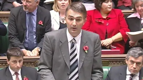 Worcester's former Labour MP Mike Foster is speaking in the Commons with other Labour politicians around him.