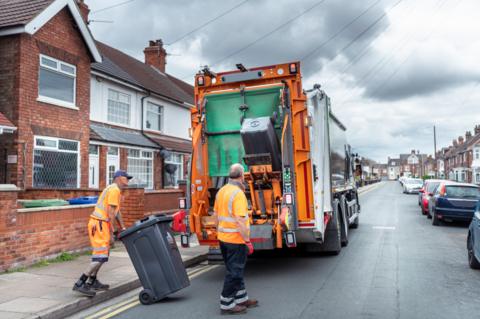 Rubbish being collected on street