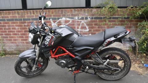 The stolen black and red motorcycle