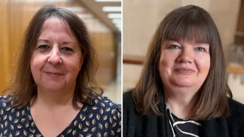 Thea Watkins and Nichola Randall. Watkins, on the left, is smiling at the camera. She has mid-length brown hair and is wearing a blue top with brown leaves on it in a pattern. Randall is also smiling at the camera. She has mid-length brown hair and a full fringe. She is wearing a black cardigan.