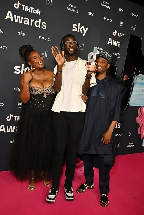 Getty Images ola Andu, Kevin Andu and guest attend The TikTok UKIE Awards 2025 at Magazine London on November 13, 2025 in London, England. 
