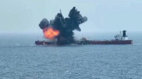 An oil tanker exploding in the red sea