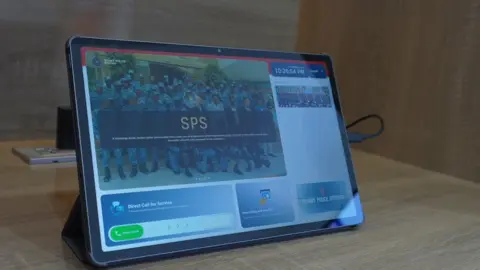 A screen on a computer tablet showing the smart police station portal.