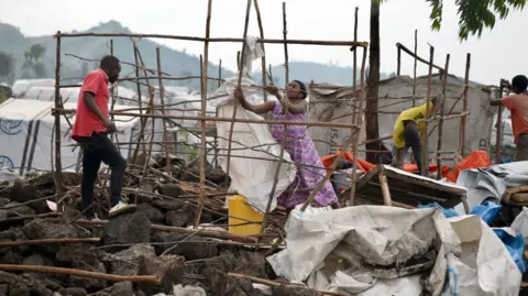 Göktay Koraltan / BBC Bulengo camp dismantling tents