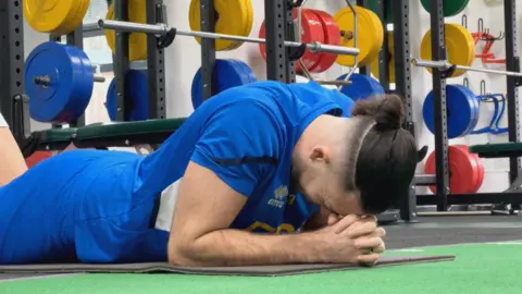 Ollie Harfield training in the gym at Aldershot Town's training ground.