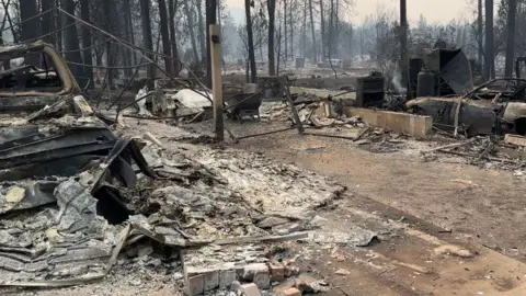 A view of James Main's home in Spokane after a raging fire swept through