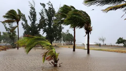 Getty Images This photograph shows a flooded road in Saint-Paul de La Reunion, on the French overseas Indian Ocean island of La Reunion.