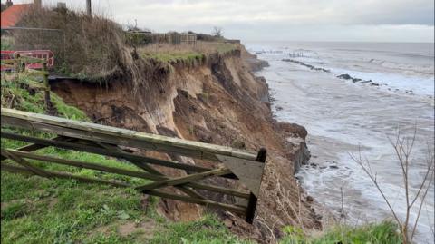 Erosion off cliffs at Happisburgh following a storm inJanuary.