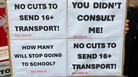 Placards about Send 16+ transport