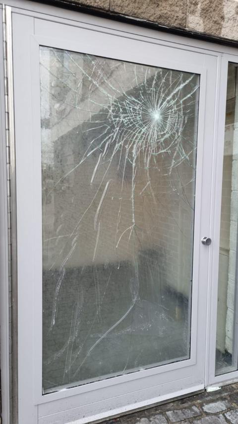 Smashed glass door