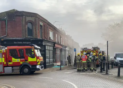 HFRS Firefighters in a smoke-filled Northam Road, Southampton