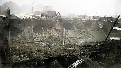 Chris Smith/West Yorkshire Fire and Rescue An old photograph of the collapsed railway station after the fire.