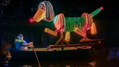 Simon Beynon/Derbyshire Dales District Council Slinky the Dog illumination on the River Derwent 