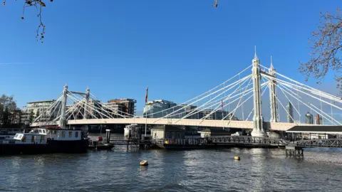 The bridge in the distance across the Thames