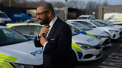 PA Media Home Secretary James Cleverly