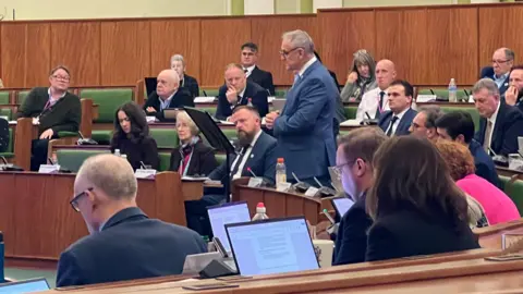 Derbyshire County Council leader Alan Graves addressed the full council in the council chamber