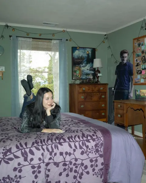 Julia Wolf Julia Wolf reclines on a bed, in a replica of the fictional character Bella Swan's bedroom from the Twilight movies.