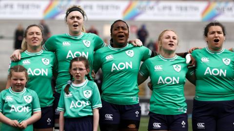 Ireland players stand for the anthem