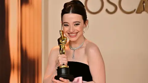 Getty Images US actress Mikey Madison poses in the press room with the Oscar for Best Actress in a Leading Role for 