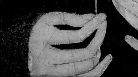 Hamilton Kerr Institute A black and white radiography scan of a painted hand. There are faint sketch lines seen in the painting.